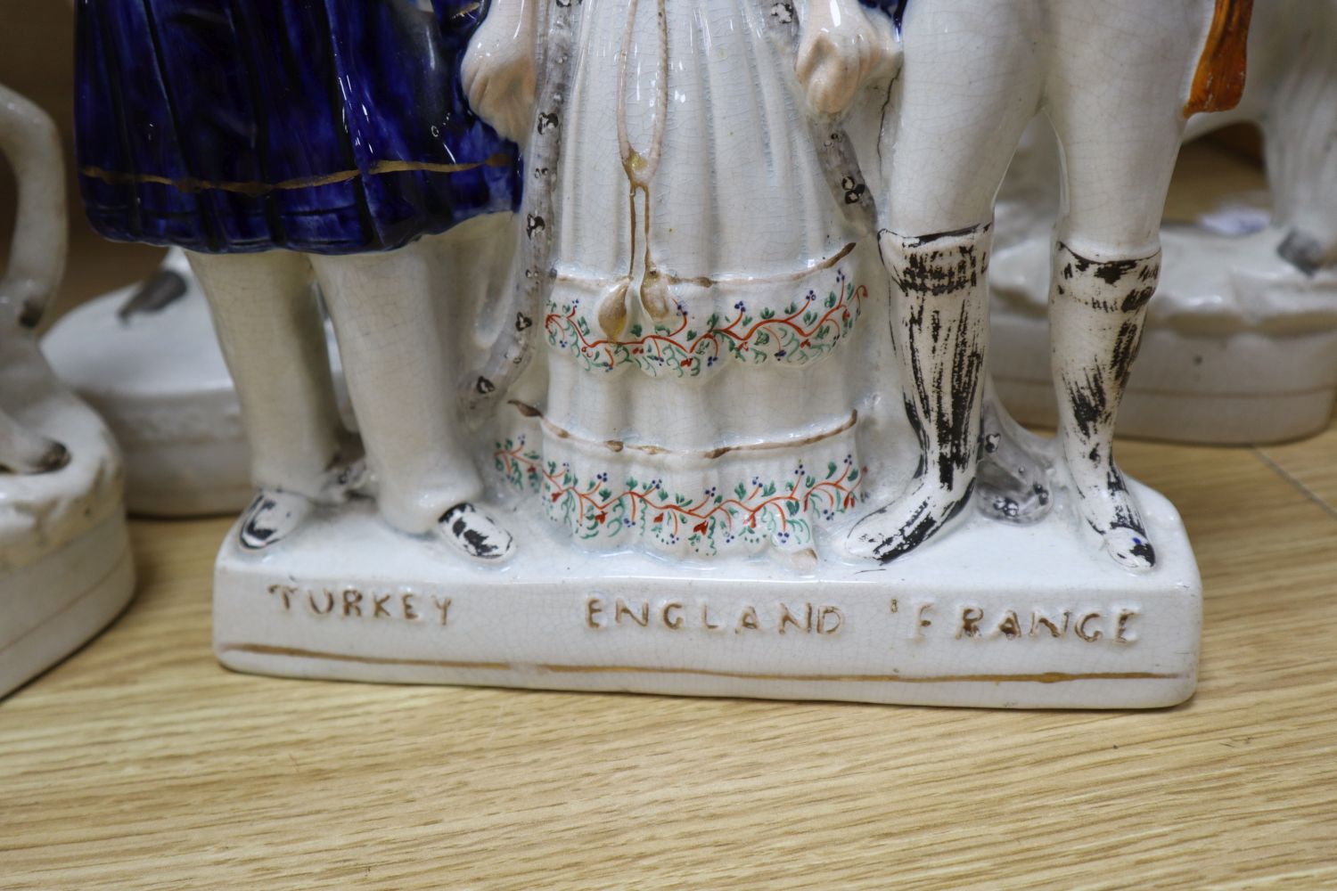 Five mid 19th century Crimean War related Staffordshire figure groups including EN. Napoleon, 40cm (some damage)